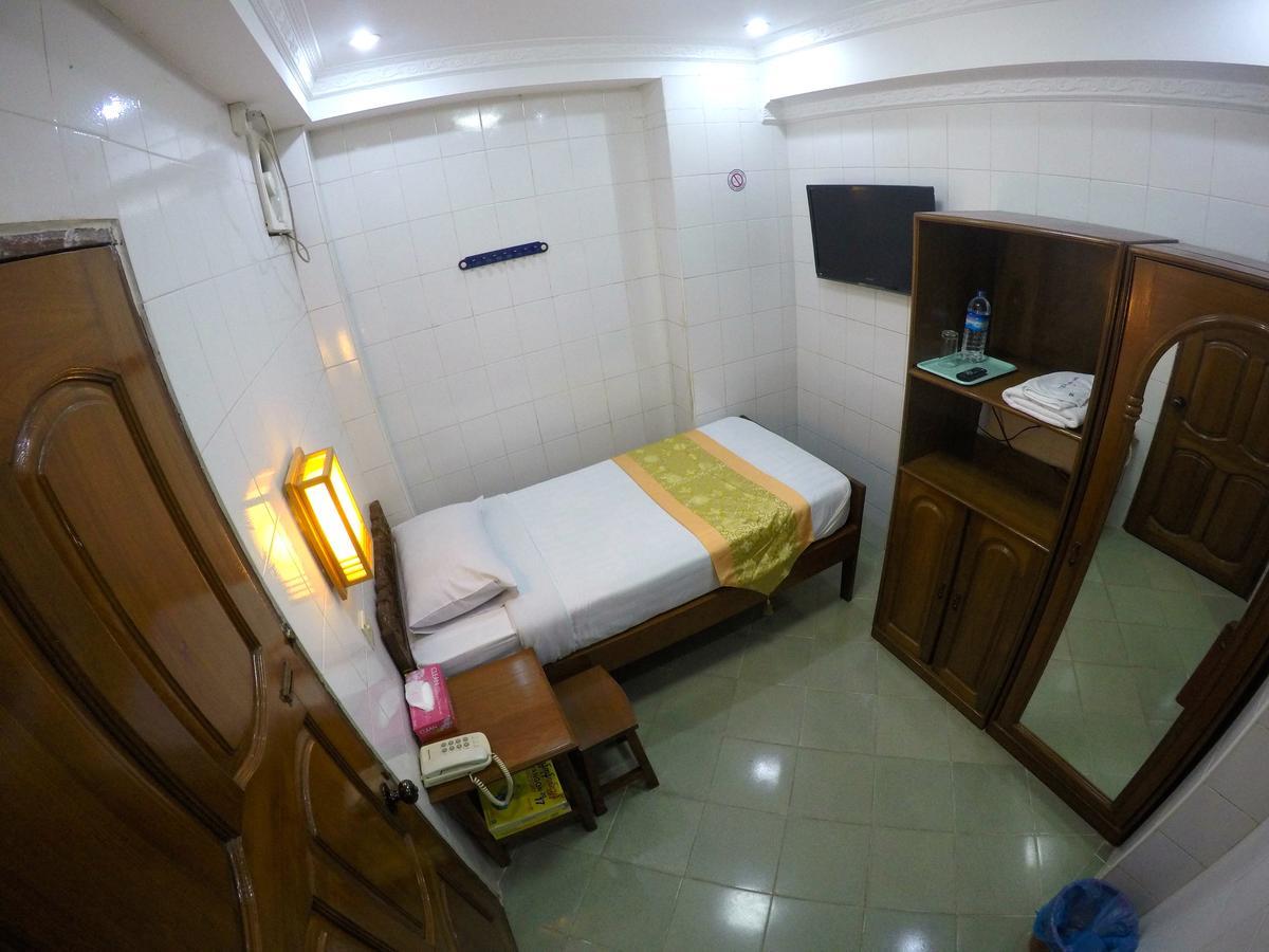 May Shan Hotel Yangón Habitación foto